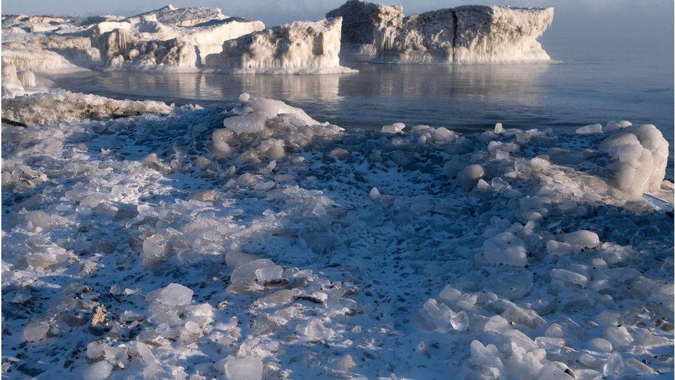 Lake with giant ice and snow clusters