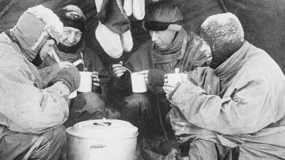 Scott, Wilson, Bowers and Evans eating supper on the march