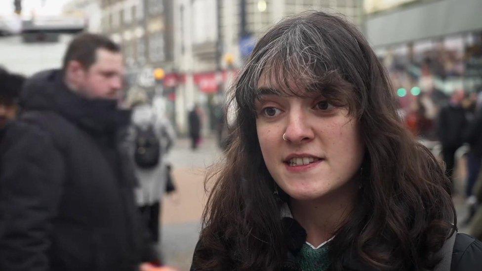 Madeleine Stone, a woman with brown hair, standing on a street in Croydon