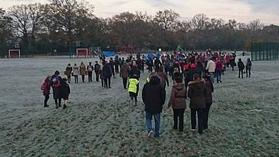 Parents and pupils set off on the walk