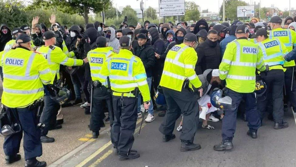 Police face protestors in Melton Road