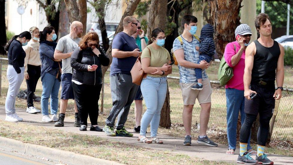 People queue in Adelaide on Monday