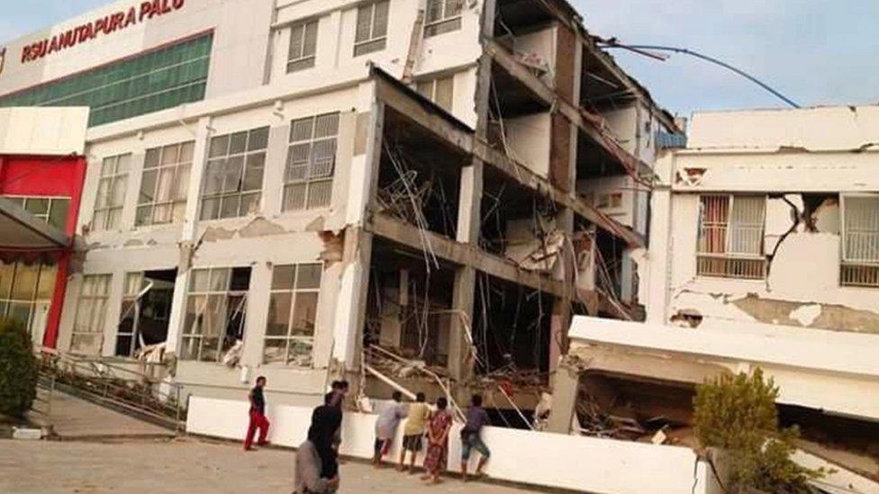 A collapsed hospital in Palu, Indonesia