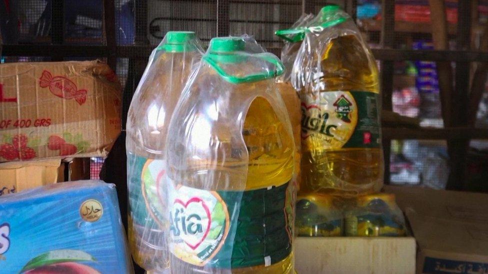 Bottles of cooking oil in a small shop