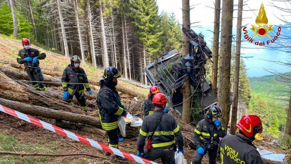 Rescuers at work at the area of the cable car accident,