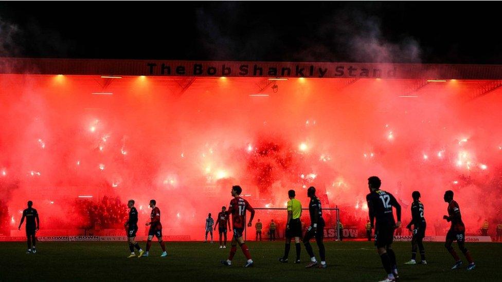 Smoke could be seen bellowing out of the stands at Dens Park