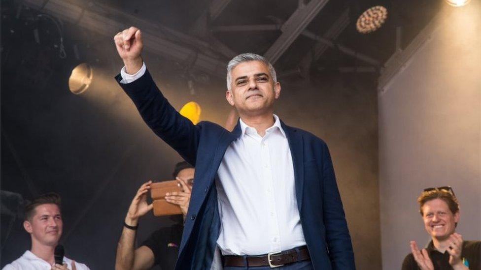 Mayor of London Sadiq Khan waves to the crowd in Trafalgar Square after the Pride London parade,