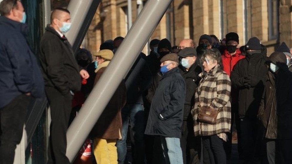 Queue of people waiting for jabs at the Centre for Life in January 2020