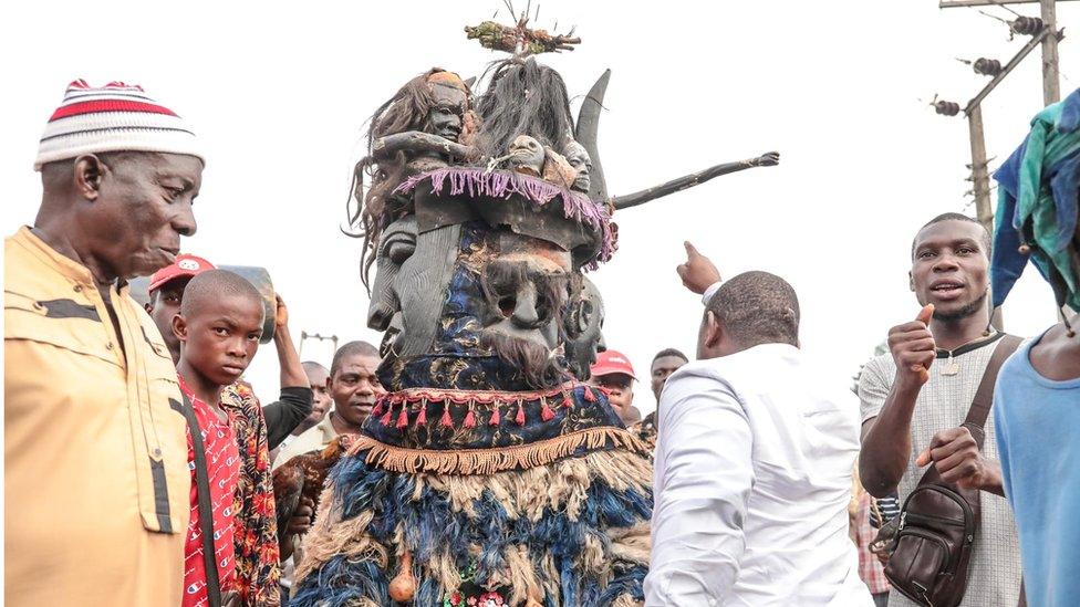 Man in a masquerade costume in Arondizuogu during the Ikeji Festival in Nigeria