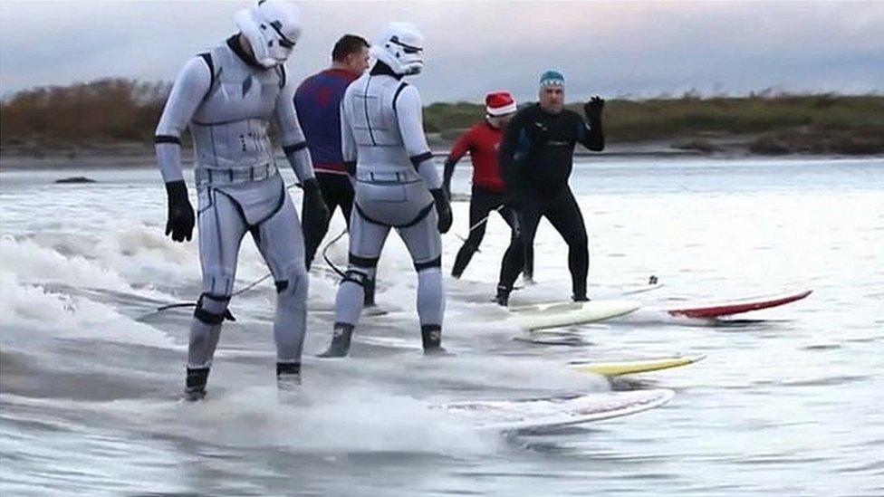 Star Wars stormtroppers riding the Severn Bore