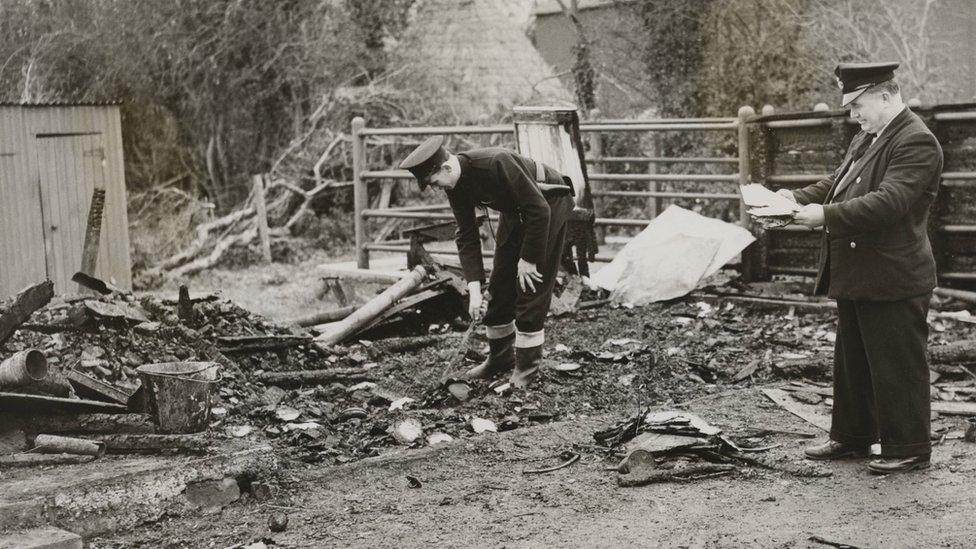 The aftermath of a 1956 bomb at a British customs post near the Armagh/Monaghan border