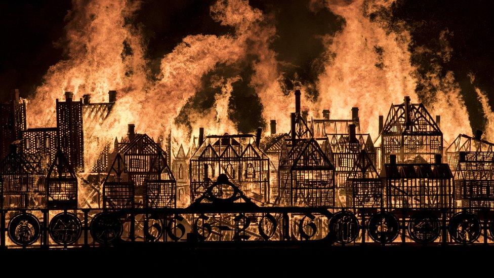 A model of London's skyline set alight