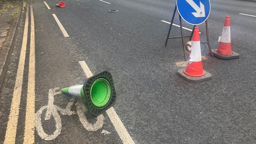 Traffic cones knocked over on cycle lanes on the A56