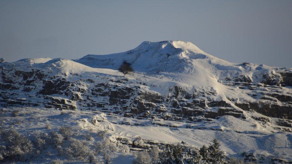 A snow-covered Morlais Castle in Merthyr Tydfil