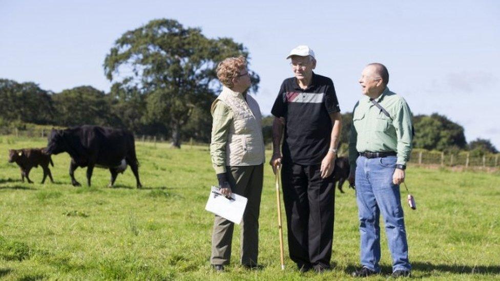 Vicki Graham (left) and her husband Barry (right), from Yankton, South Dakota, with Archie Watt (middle)