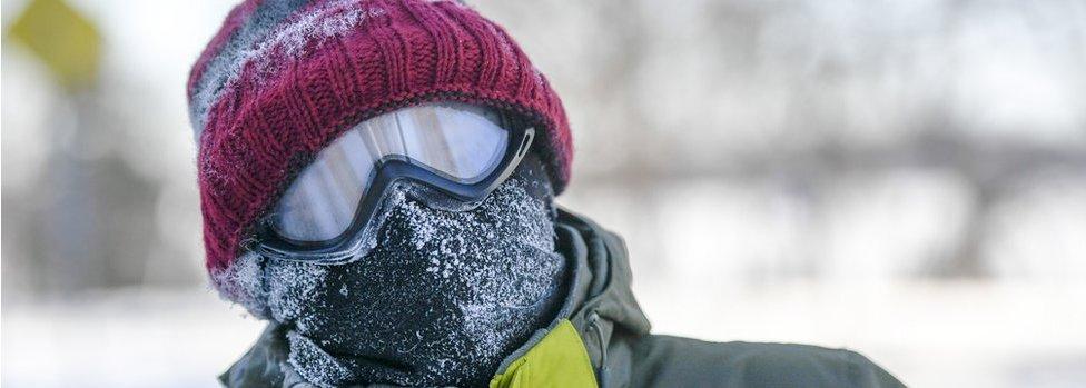 Steven Willy of Minneapolis bundled up for a mile walk in the sub-zero temperatures that has also produced dangerous windchills in Minneapolis