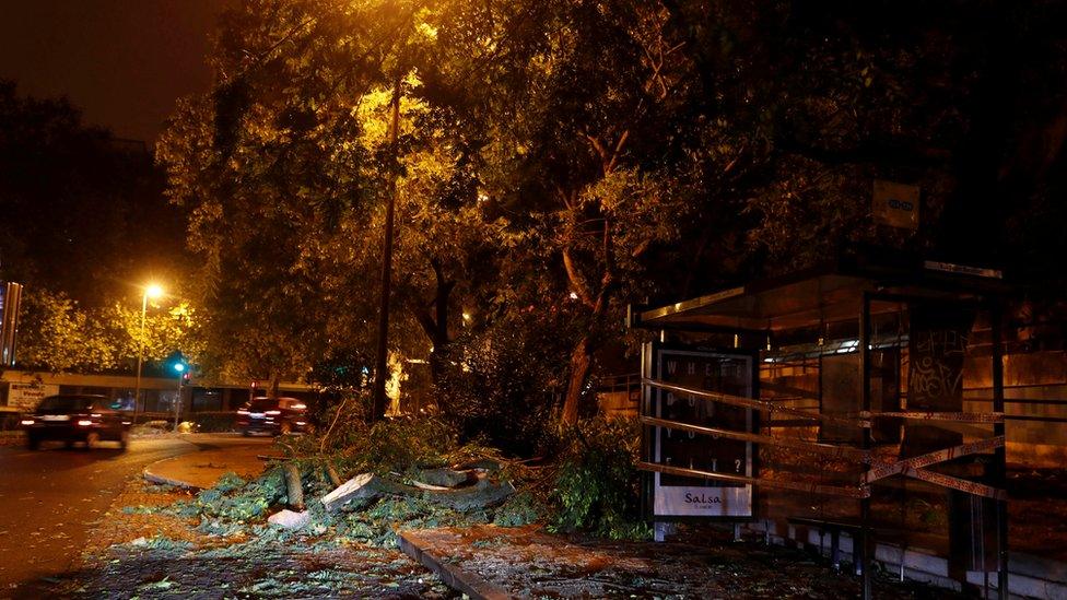 Branches of trees are seen on a street at Benfica neigborhood as hurricane Leslie goes past in Lisbon, Portugal October 14, 2018