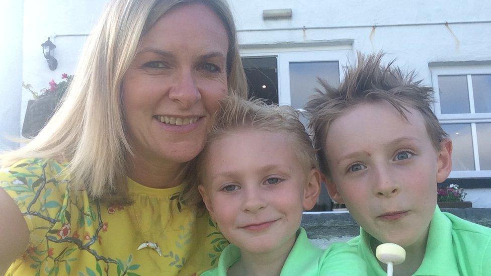 Kerry McAuley and her sons