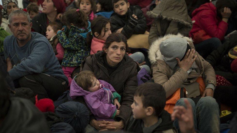 Refugee families queue to enter Macedonia at the Greek-Macedonia border in Idomeni. 3 March 2016