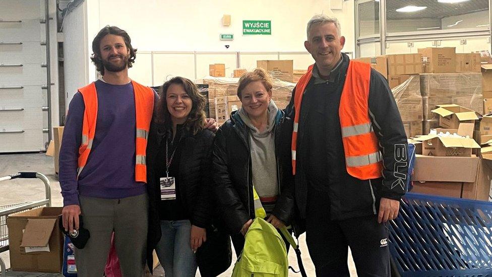 Neil Spalding (l) with Marta Szyjkowska, another centre volunteer, and Stuart Thomas (r)