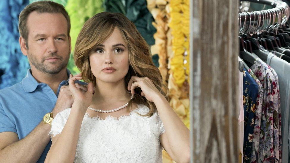 L to R Dallas Roberts as Bob and Debby Ryan as Patty