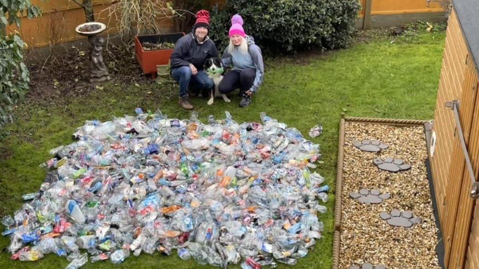 The couple with Scruff and the bottles collected in 2022