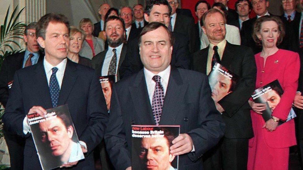 Tony Blair, John Prescott and Labour MPs hold the party's "New Labour" manifesto in 1997