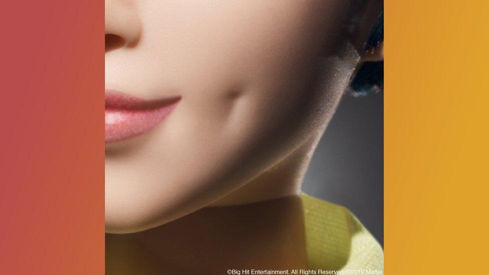 Close-up image of BTS doll.