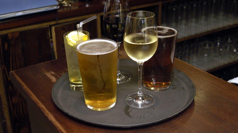 Drinks on a tray at a bar