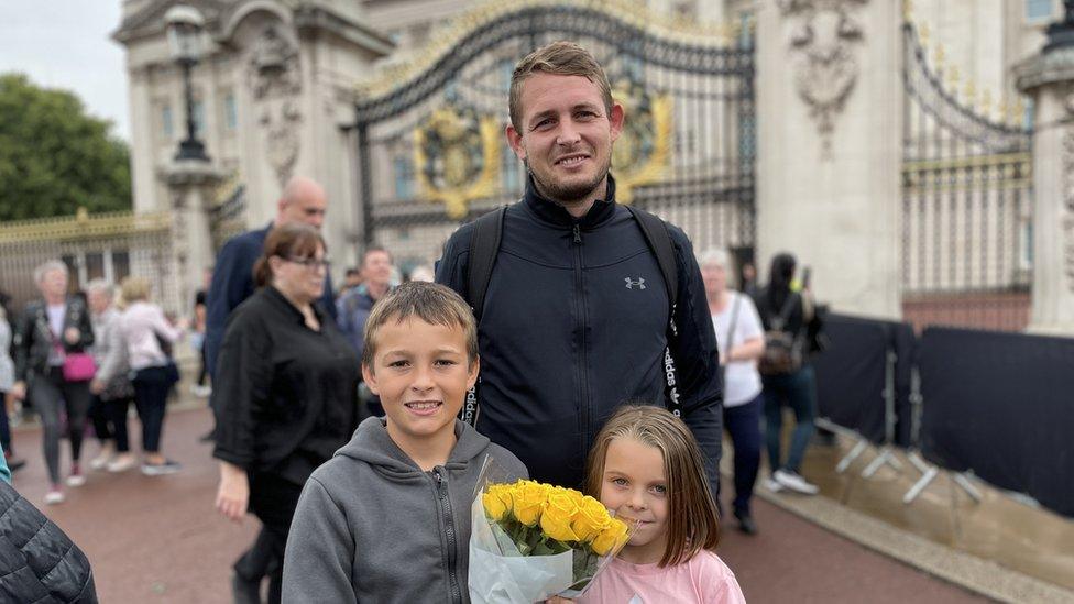 Tom Whiting and children at Buckingham Palace