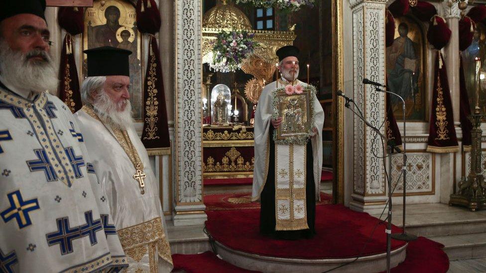 Orthodox priests during a liturgy following the easing of measures against the spread of the coronavirus disease in Athens, Greece, on 20 May, 2020