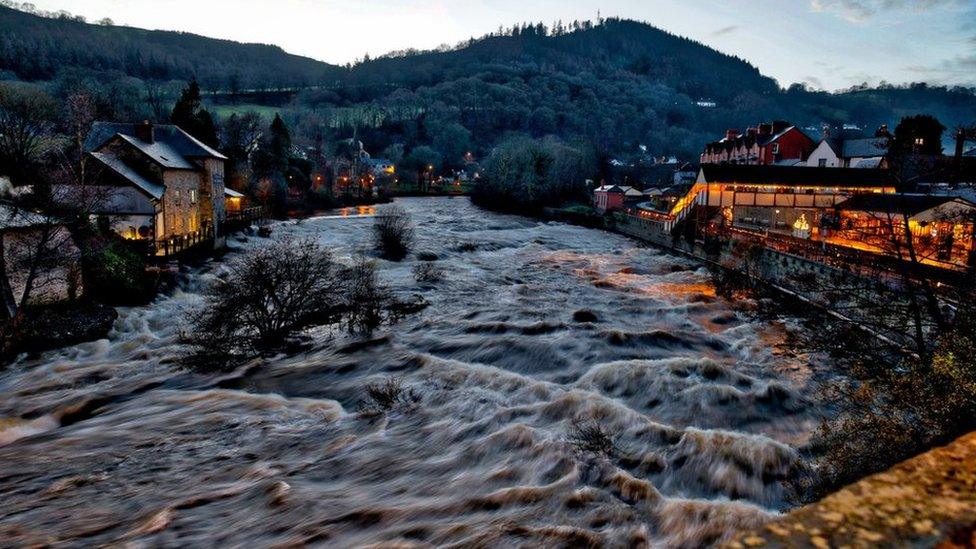 The tide rushes at dusk in Llangollen, Denbighshire