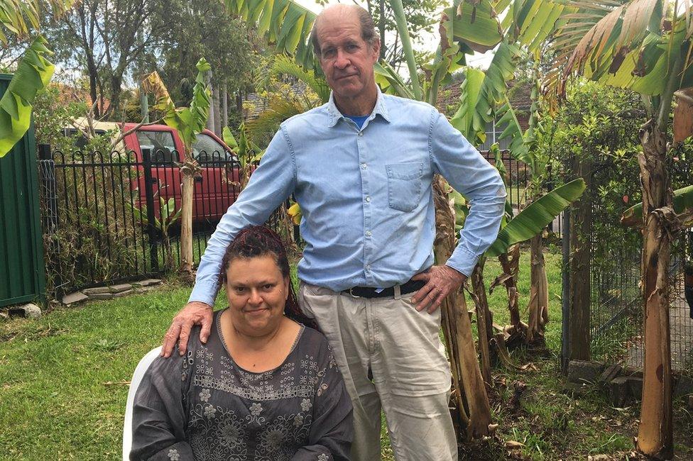 James Ricketson places his hand on Roxanne Holmes's shoulder in Sydney last month