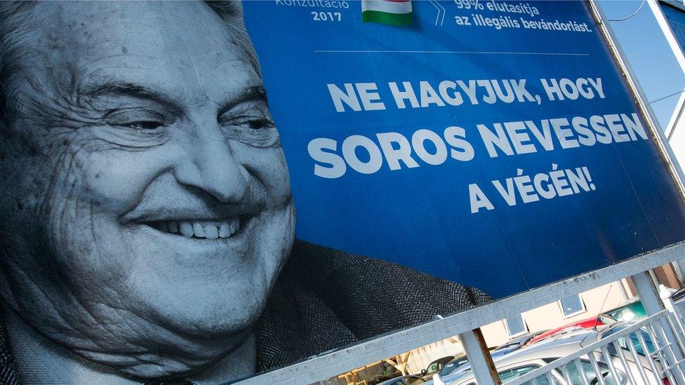 A poster showing US billionaire George Soros is pictured on July 6, 2017 in Szekesfehervar, Hungary