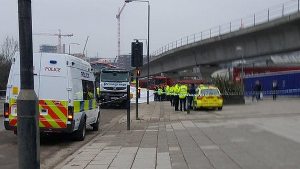 Police attend the scene in Silvertown