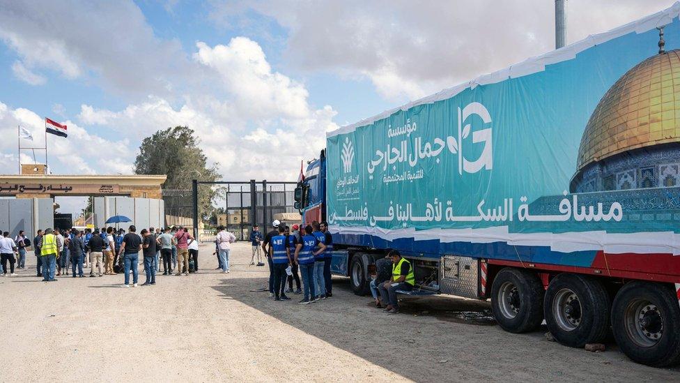 A truck of a humanitarian aid convoy for the Gaza Strip is parked outside Rafah border gate, Egypt