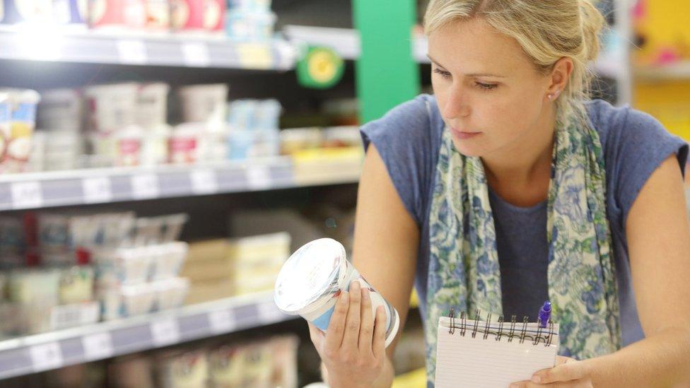 Woman shopping in supermarket