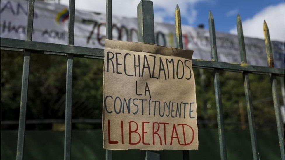 A posted sign reads "We reject the Constituent. Freedom" in front of a polling station in Caracas, Venezuela, 24 July 2017.