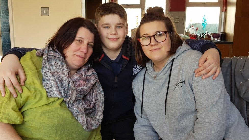 (L-r) Mother Fleur, son Bassy and daughter Immy