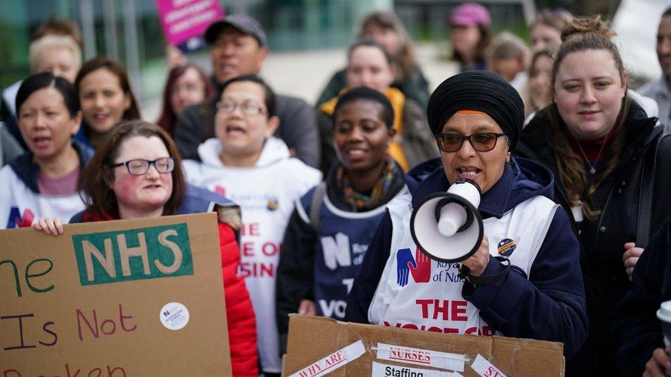 Members of the Royal College of Nursing union on the picket line outside Queen Elizabeth hospital in Birmingham