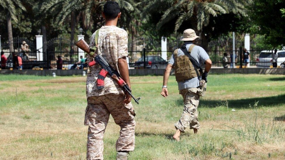 Men with weapons responding to attack