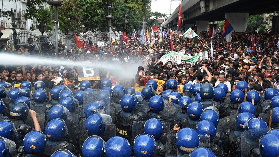 Riot police used water cannons to repel the protesters