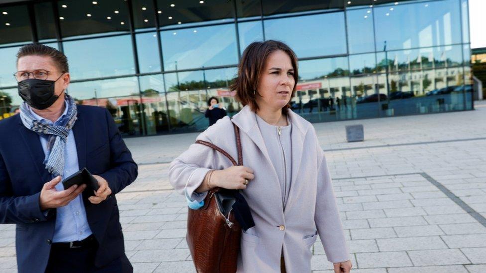 Green Party Co-Chairwoman Annalena Baerbock leaves after attending exploratory talks to build a new German government coalition, in Berlin, Germany, October 7, 2021.