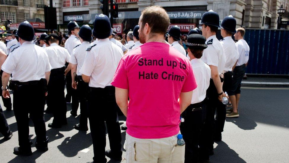 Man protesting against hate crime