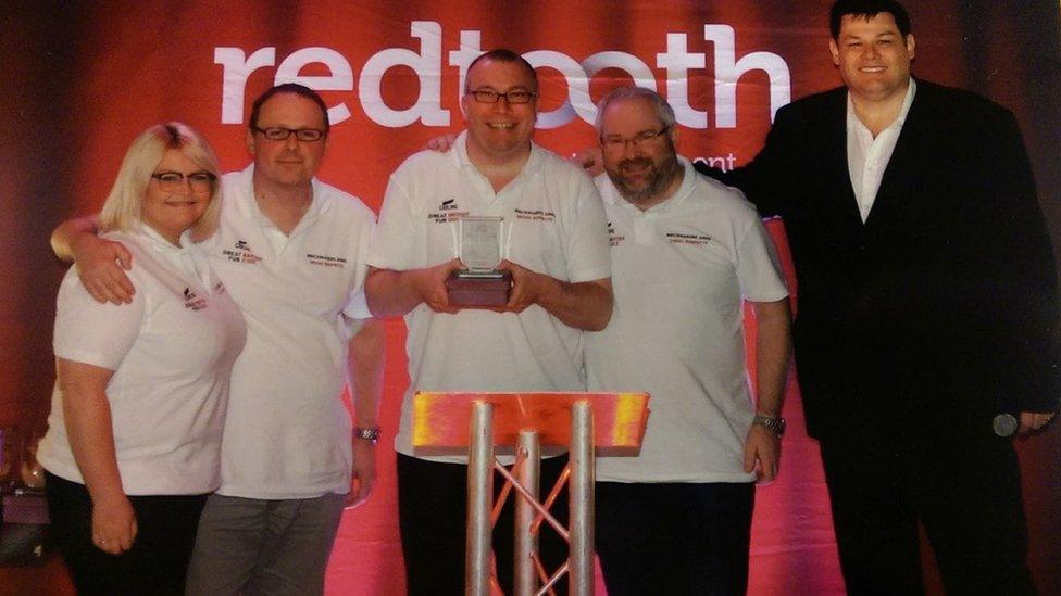 Gareth (right), with Mark Labbett from The Chase (far right), after winning the Great British Pub Quiz in 2017