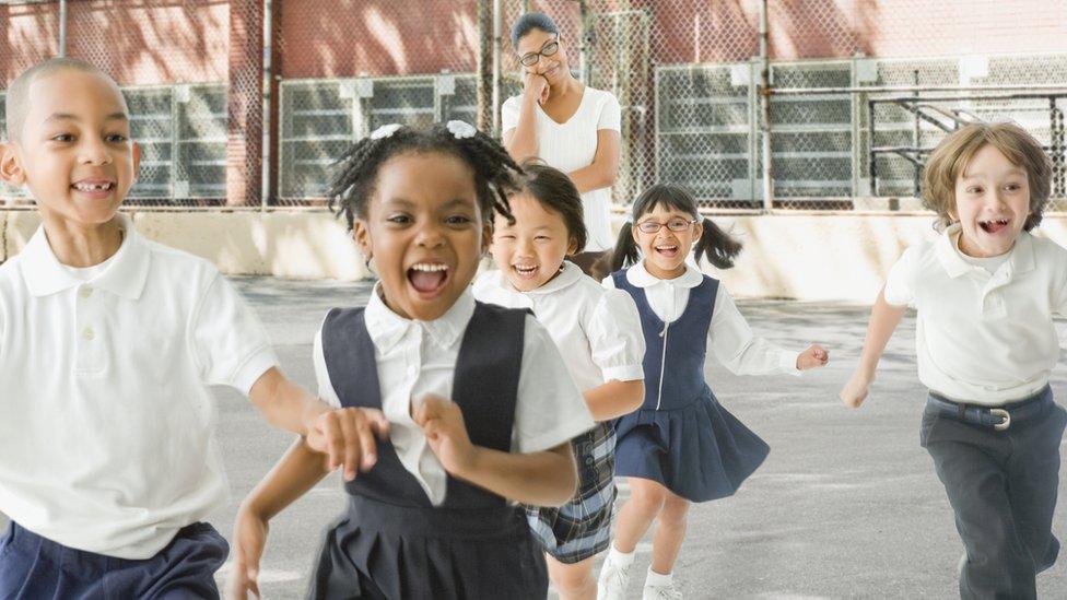 group-of-kids-running-in-playground