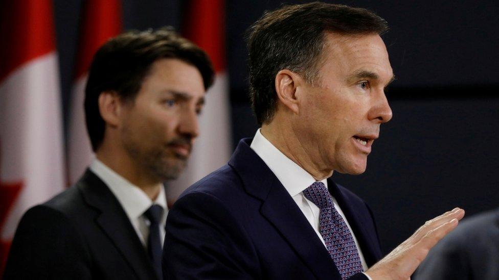 Canada's Minister of Finance Bill Morneau attends a news conference with Prime Minister Justin Trudeau in Ottawa, Ontario, Canada March 11, 2020