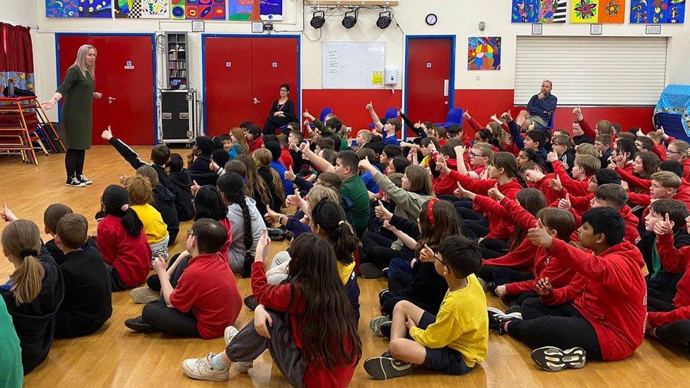 Year 5 and 6 pupils at Bailey's Court Primary School sat in the school hall listening to a talk