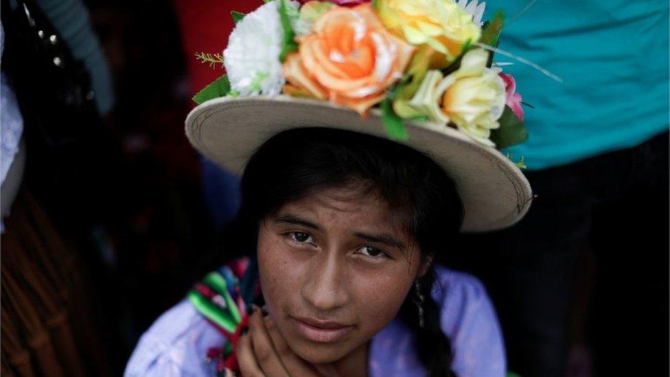 An indigenous woman looks on during a Bolivia's former President Evo Morales"s caravan after his return to the country, in Chimore, Bolivia November 11, 2020.