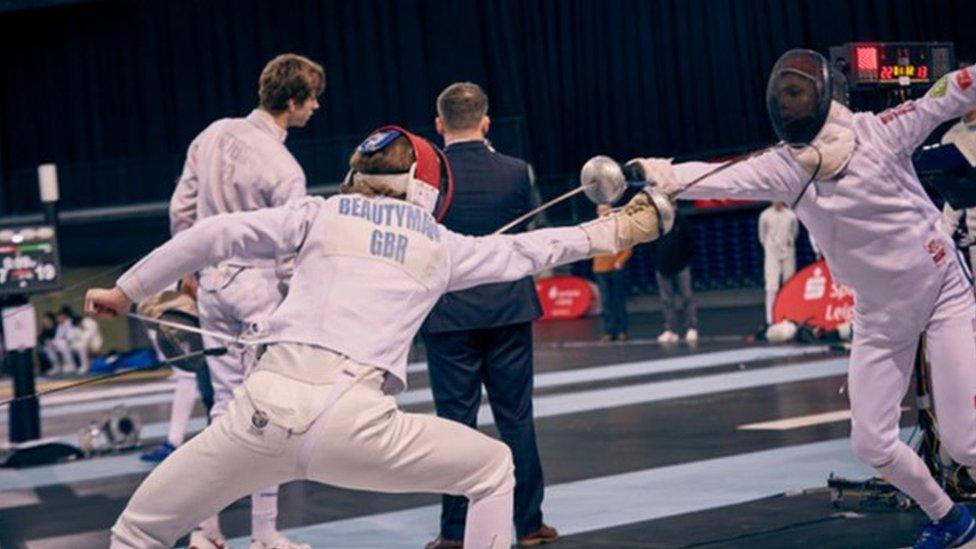 Cador Beautyman scoring a hit against a Danish opponent